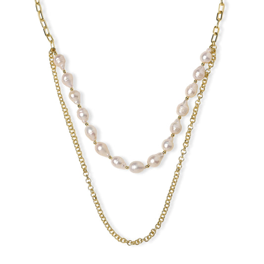 Layered gold chain necklace with organic baroque freshwater pearls and adjustable length on cream background