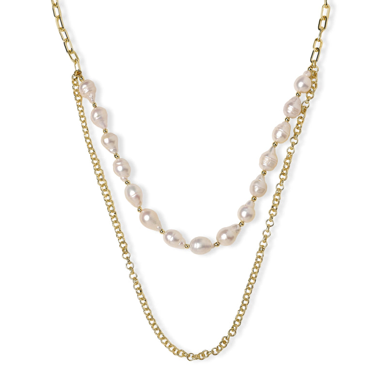 Layered gold chain necklace with organic baroque freshwater pearls and adjustable length on cream background
